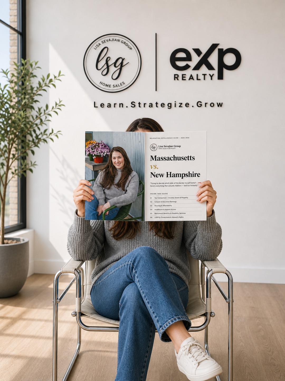 MA vs NH Relocation Intelligence Guide held in front of LSG + eXp wall lockup